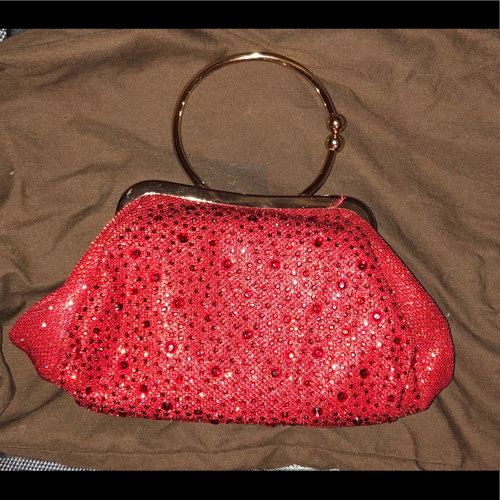 red clutch and matching accessories